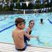 Six-year-old Harold Crowner rests on the side of the pool as he takes a break from swimming laps with the Buhr Park Sharks. Melanie Maxwell | AnnArbor.com